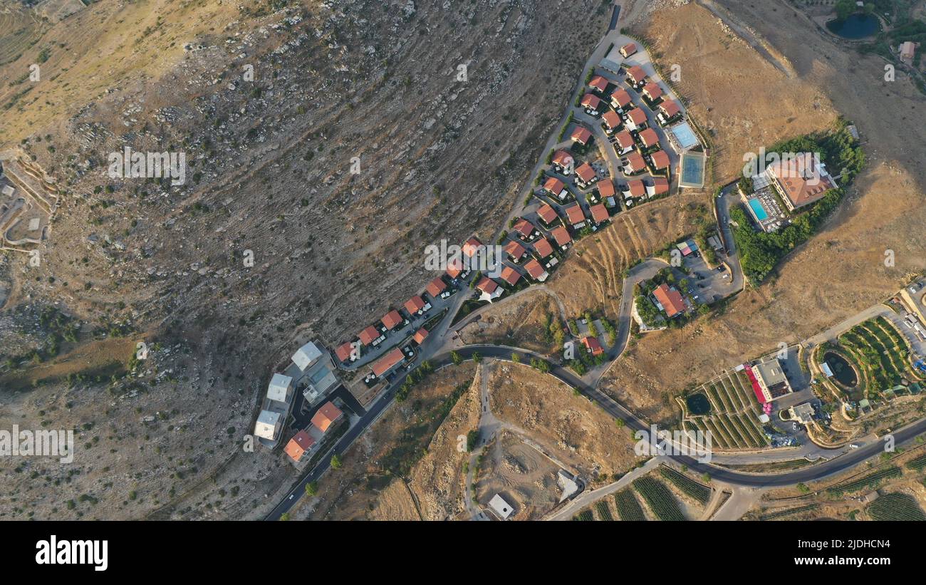 Faraya village with neighborhood in semi-desert, Mount Lebanon, Middle East, houses with red roofs Stock Photo