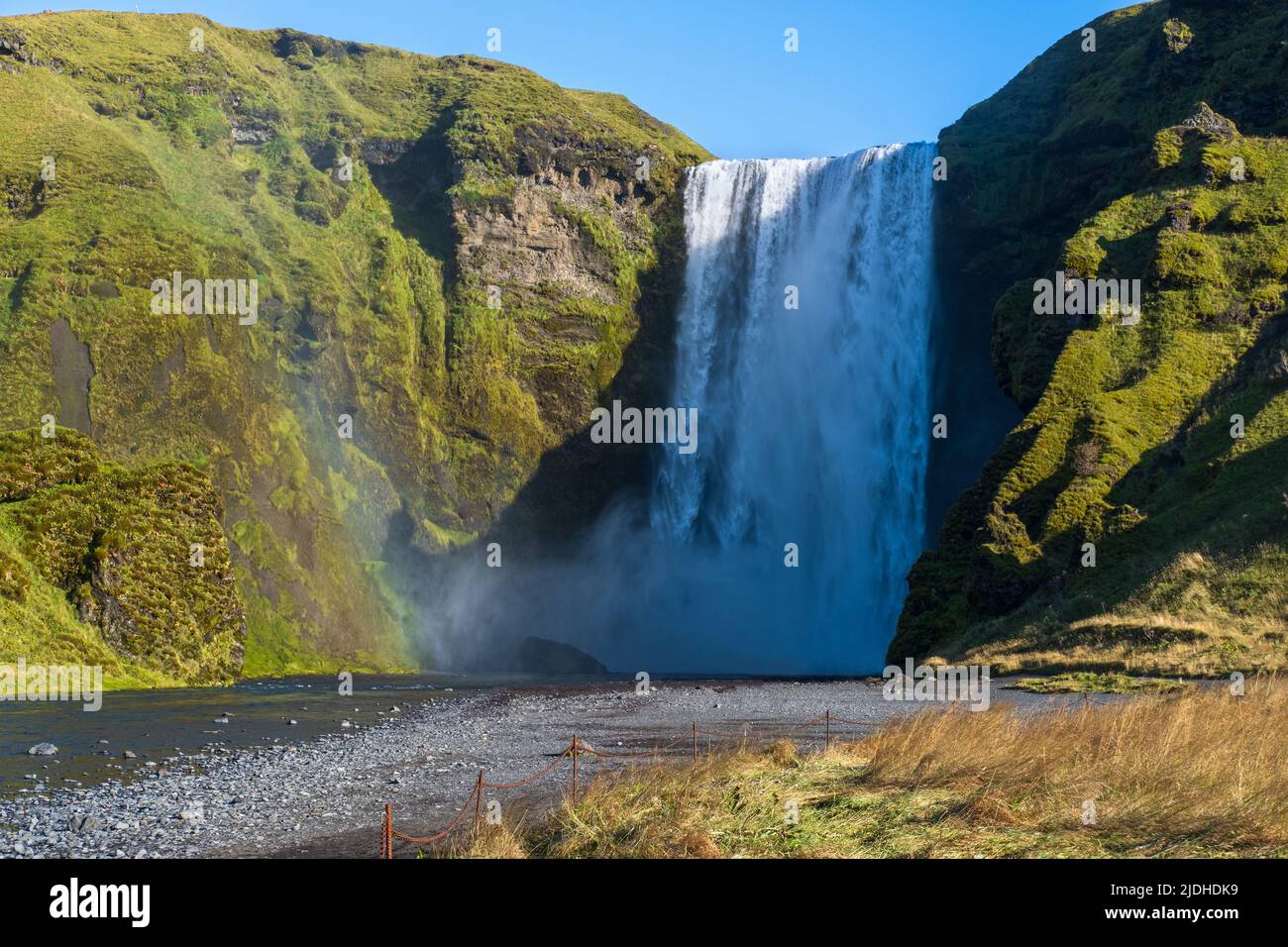 Picturesque full of water big waterfall Skogafoss autumn view, southwest Iceland. Stock Photo