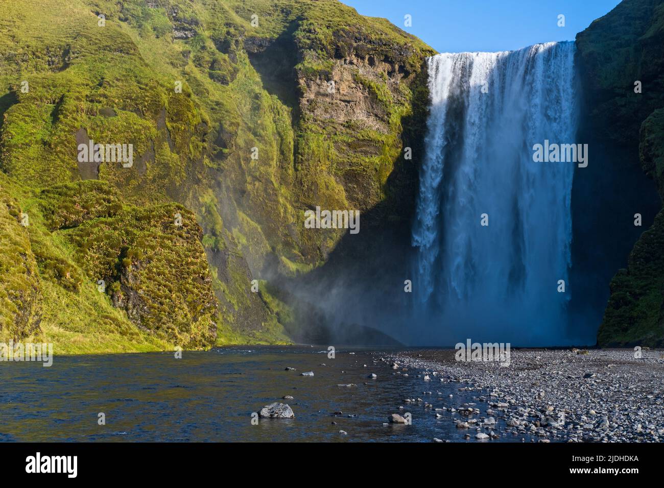 Picturesque full of water big waterfall Skogafoss autumn view, southwest Iceland. Stock Photo