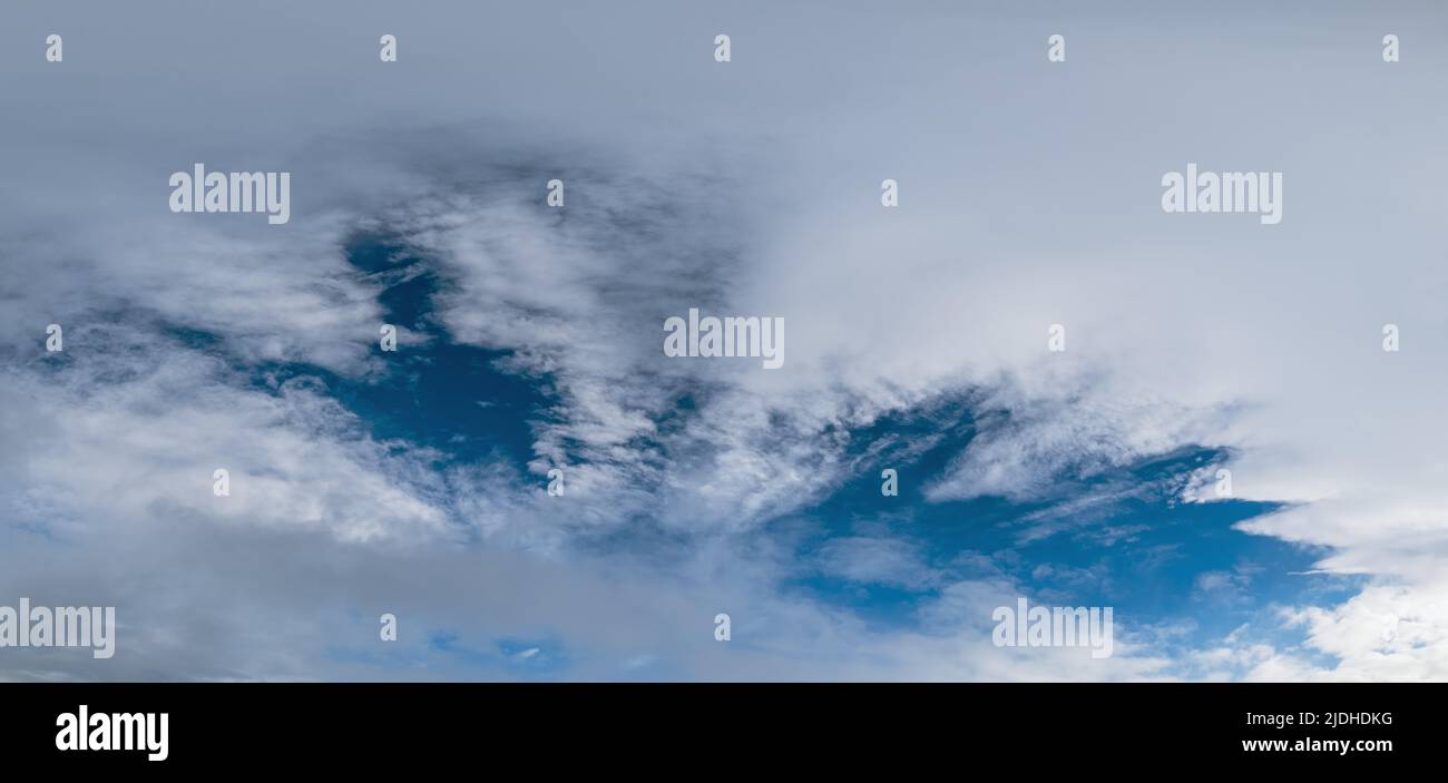 White clouds in blue summer sky panoramic  background Stock Photo