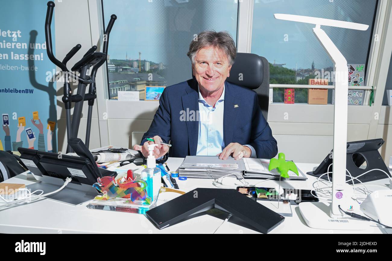 Stuttgart, Germany. 21st June, 2022. Manne Lucha (Bündnis 90/Die Grünen), Minister for Social Affairs and Integration in Baden-Württemberg, sits at his desk in his ministry. The health minister and corona manager in the southwest wants to prepare the state for a possible wave in the fall. (to dpa: 'Minister of Health Lucha: 'We can control the Corona situation'') Credit: Bernd Weißbrod/dpa/Alamy Live News Stock Photo