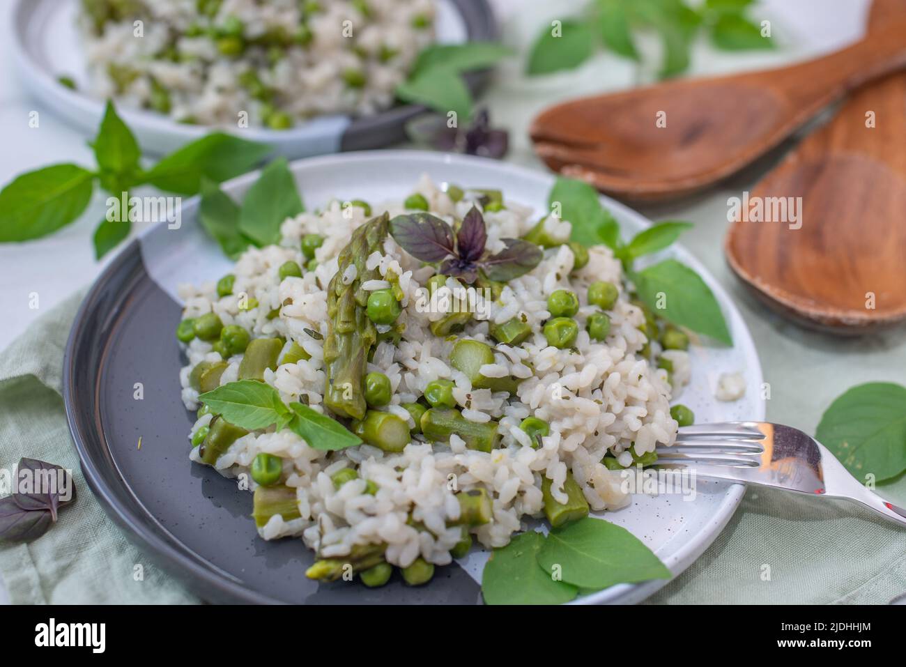 Spring food; Delicious risotto with asparagus and wild garlic Stock Photo
