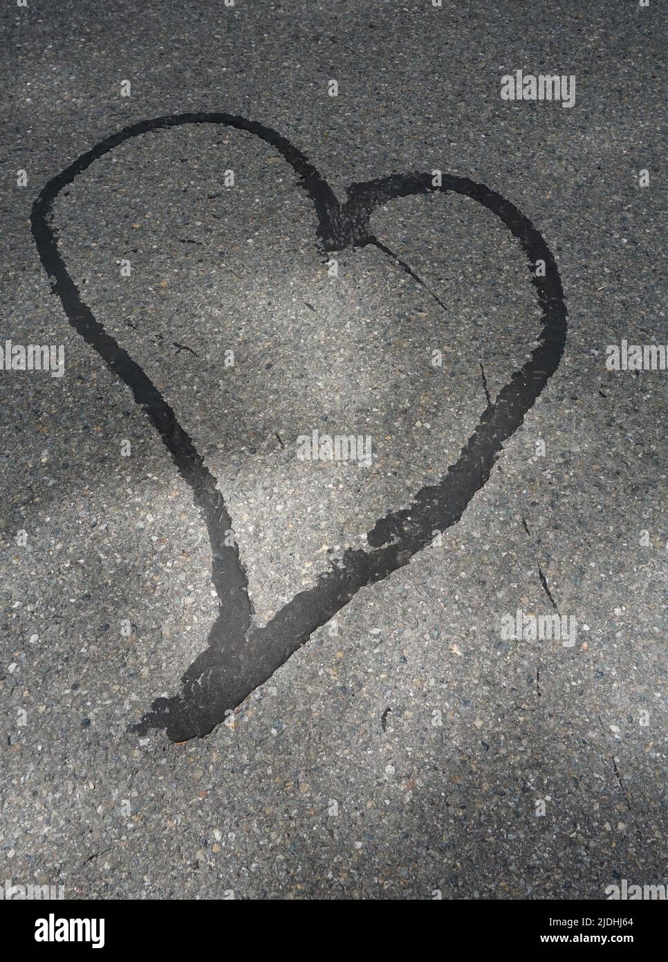 A heart painted on a pavement Stock Photo