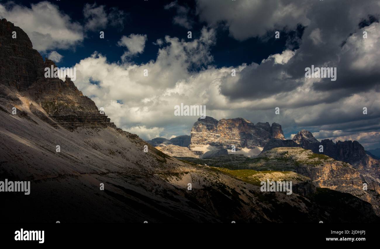 Mountains in Italys famous Dolomites with dramatic sky Stock Photo - Alamy
