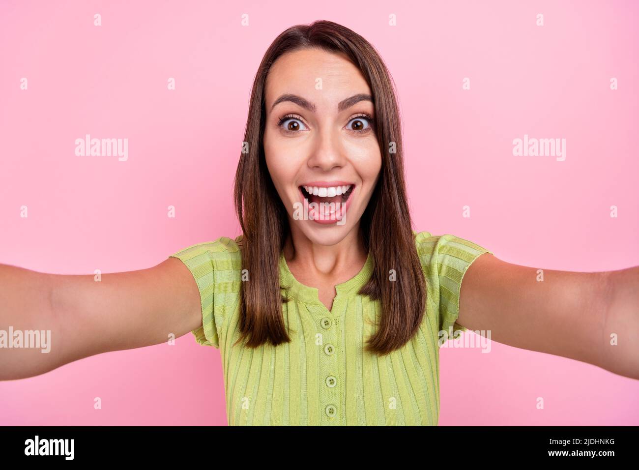 Photo of impressed brunette millennial lady do selfie wear green top ...