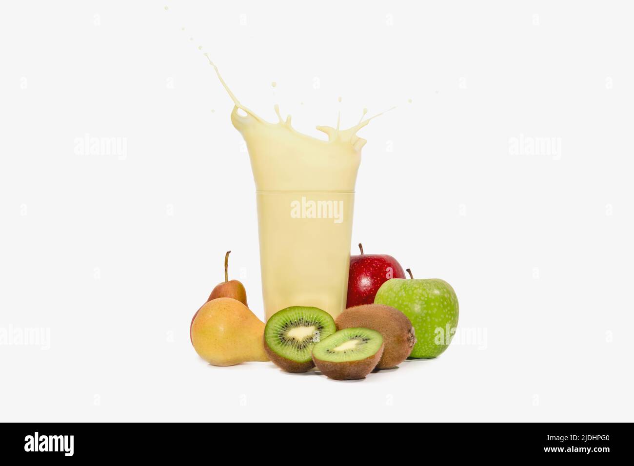 Glass of splashing banana juice with other fruits Stock Photo