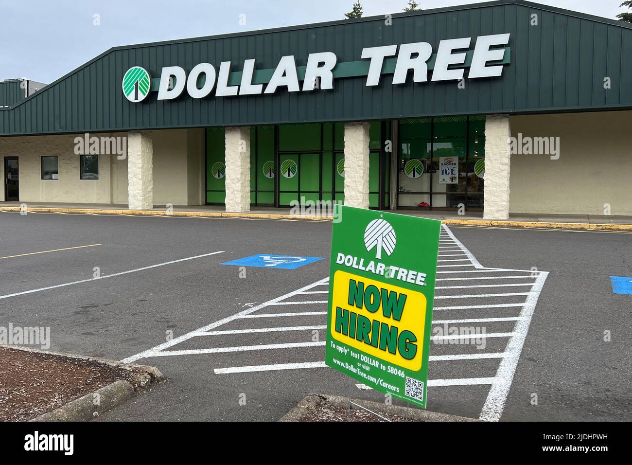 A Now Hiring employees sign at a Dollar Tree store, Thursday, June 8, 2022, in Springfield, Ore