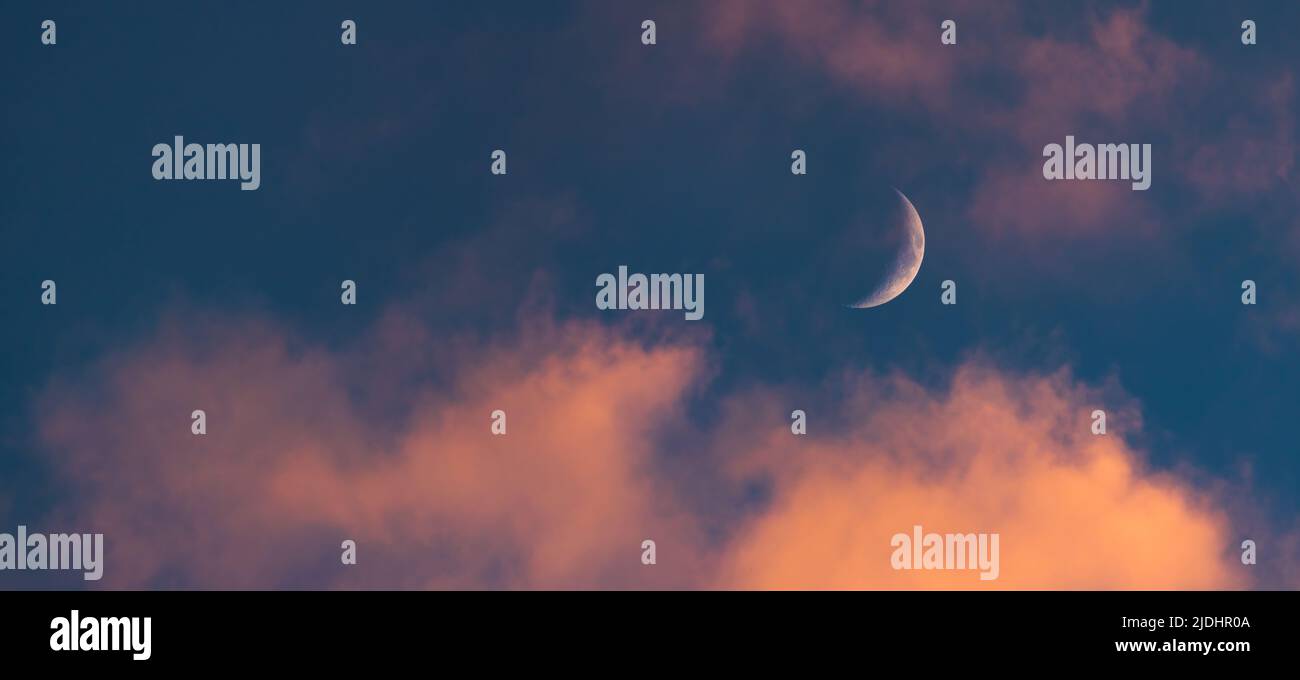 Large Cresent Moon Sunset sky with large crescent moon, evening sky background Stock Photo ...