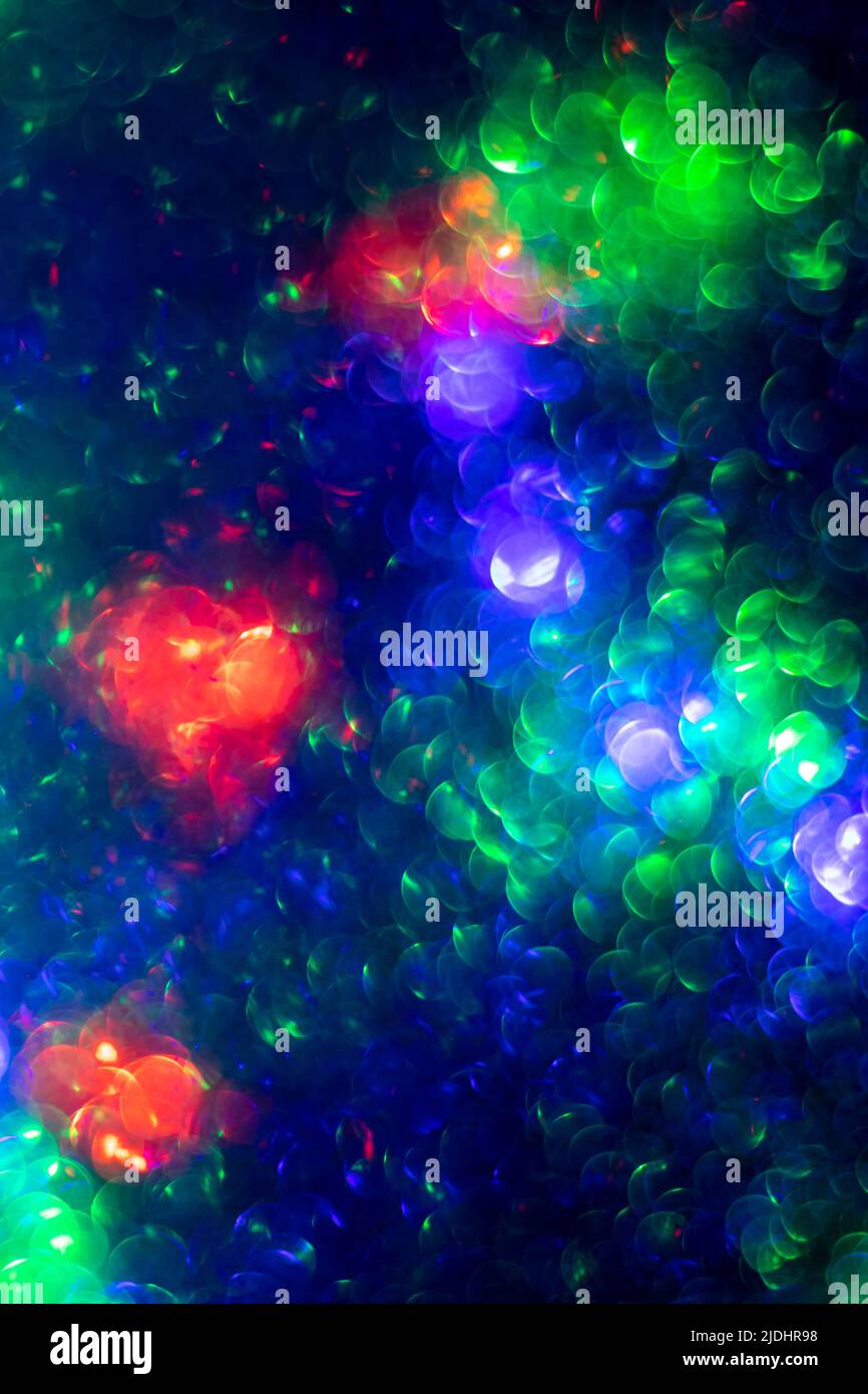 Abstract creative background with blurred bokeh, colorful bright color backdrop, dark blue futuristic wallpaper, round bokeh in shape of a circle. Nig Stock Photo