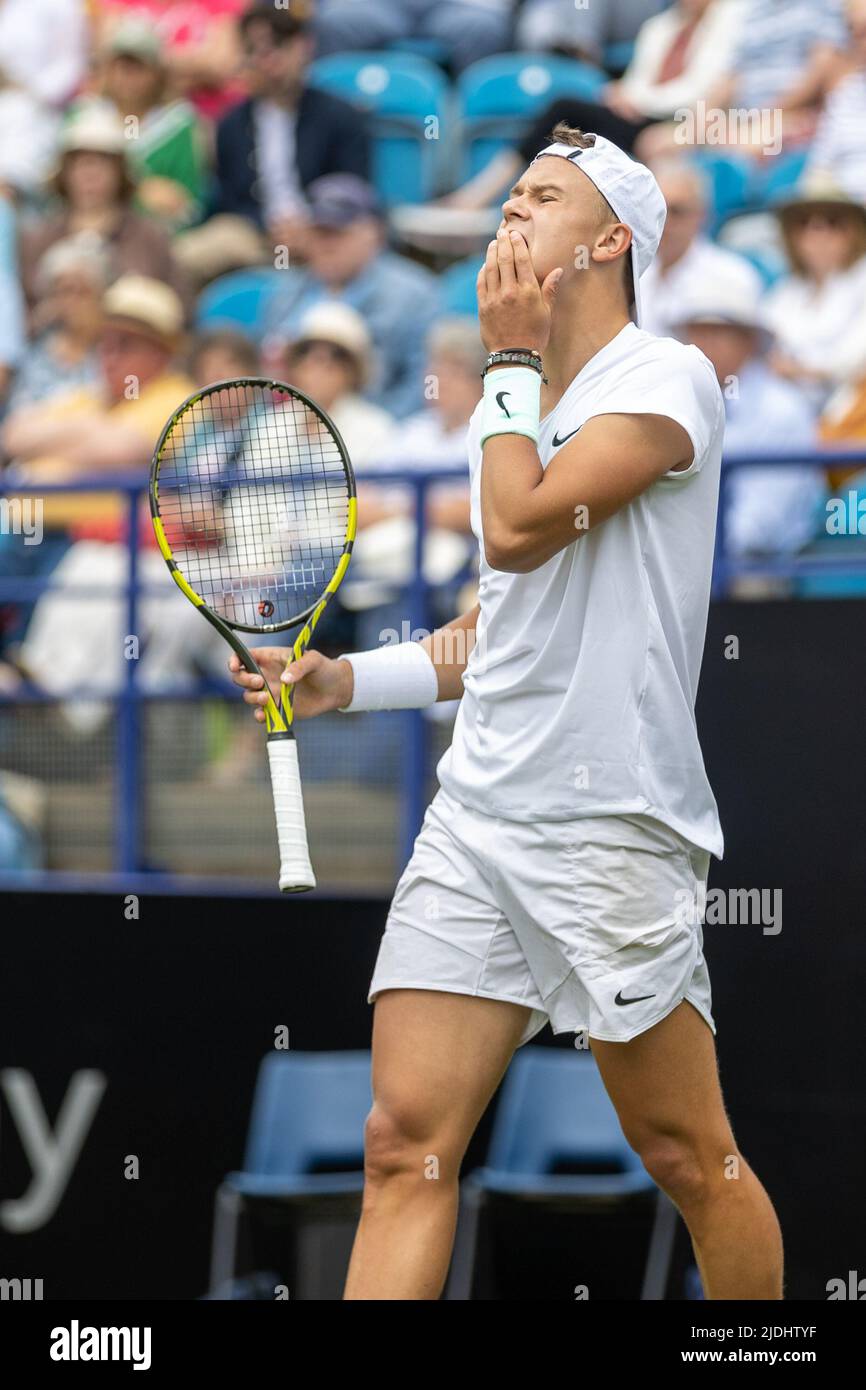 Eastbourne, England, 21 June, 2022, Tennis player, Holger Rune at the Rothesay International holding his hand to his mouth after losing a point in his game with Ryan Peniston of Great Britain