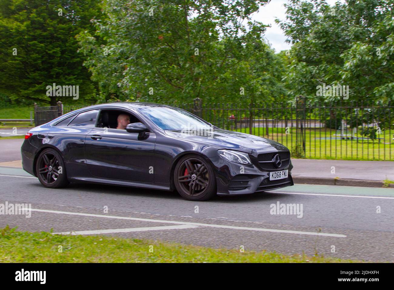 2019 black Mercedes Benz E 1991cc 9 speed automatic driving in Mancheste, UK Stock Photo