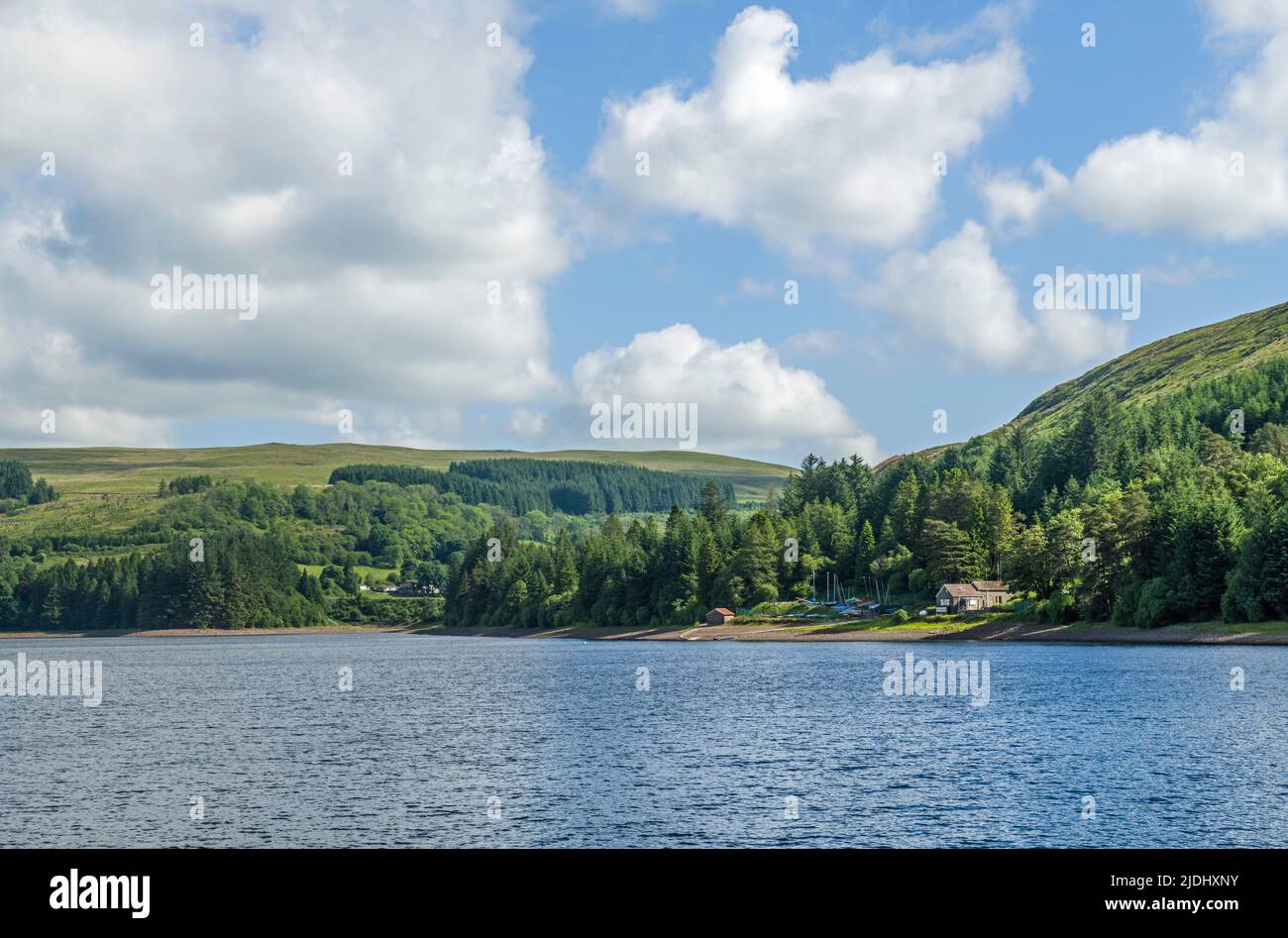 View of part of Pontsticill Reservoir showing the Boathouse on a sunny Juine Summer day Stock Photo