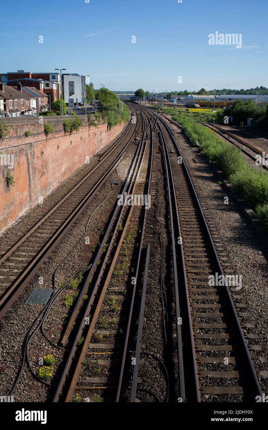 Empty railway tracks with no trains on the main line through Eastleigh ...