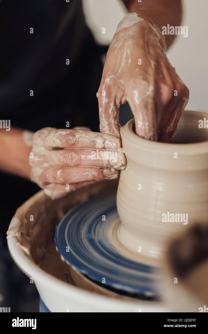 Creating Potery Close Up of Pottery Artist at Work, Potter Master Creating Clay Pot on ...