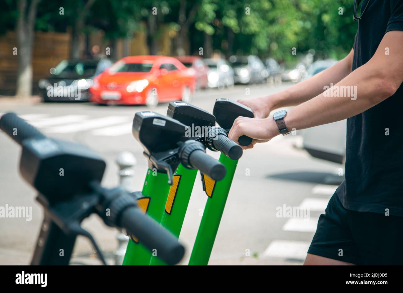 Electric scooters in a city are available for rent. close up Stock ...