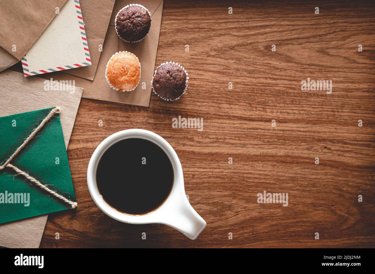 Vintage composition with envelopes on wooden background, flat lay. Stock Photo