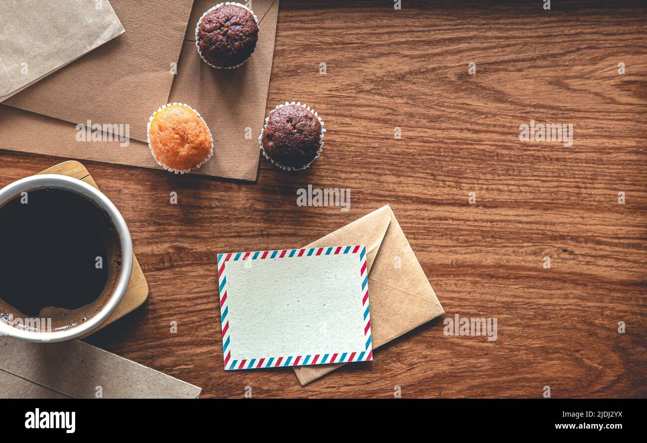 Vintage composition with envelopes on wooden background, flat lay. Stock Photo