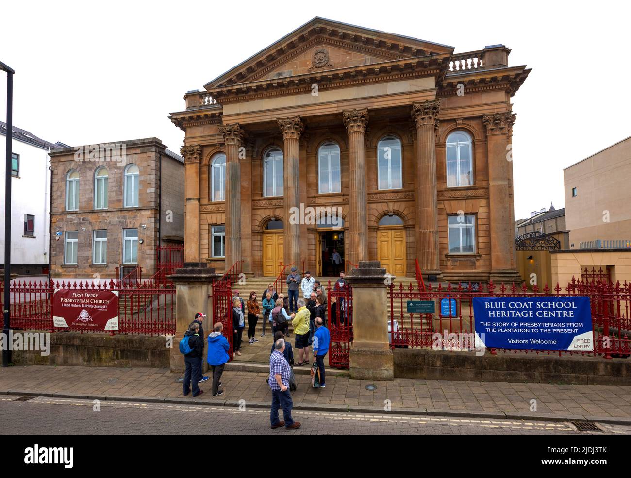 Tourists at First Derry Blue coat school heritage centre, Derry City, Northern Ireland Stock Photo