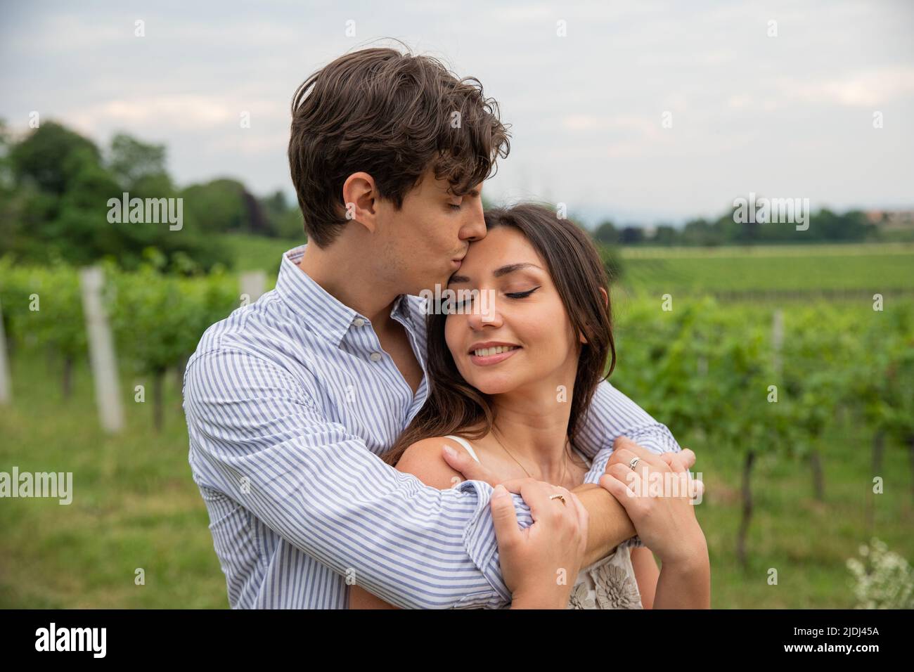 boyfriend-gives-a-kiss-on-the-forehead-of-his-girlfriend-passionate
