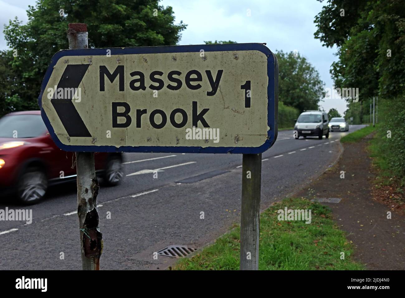 Massey Brook sign, Cliff Ln, next to the busy A50 towards the M6 Motorway, Grappenhall, Warrington, Cheshire, England, UK, WA4 Stock Photo