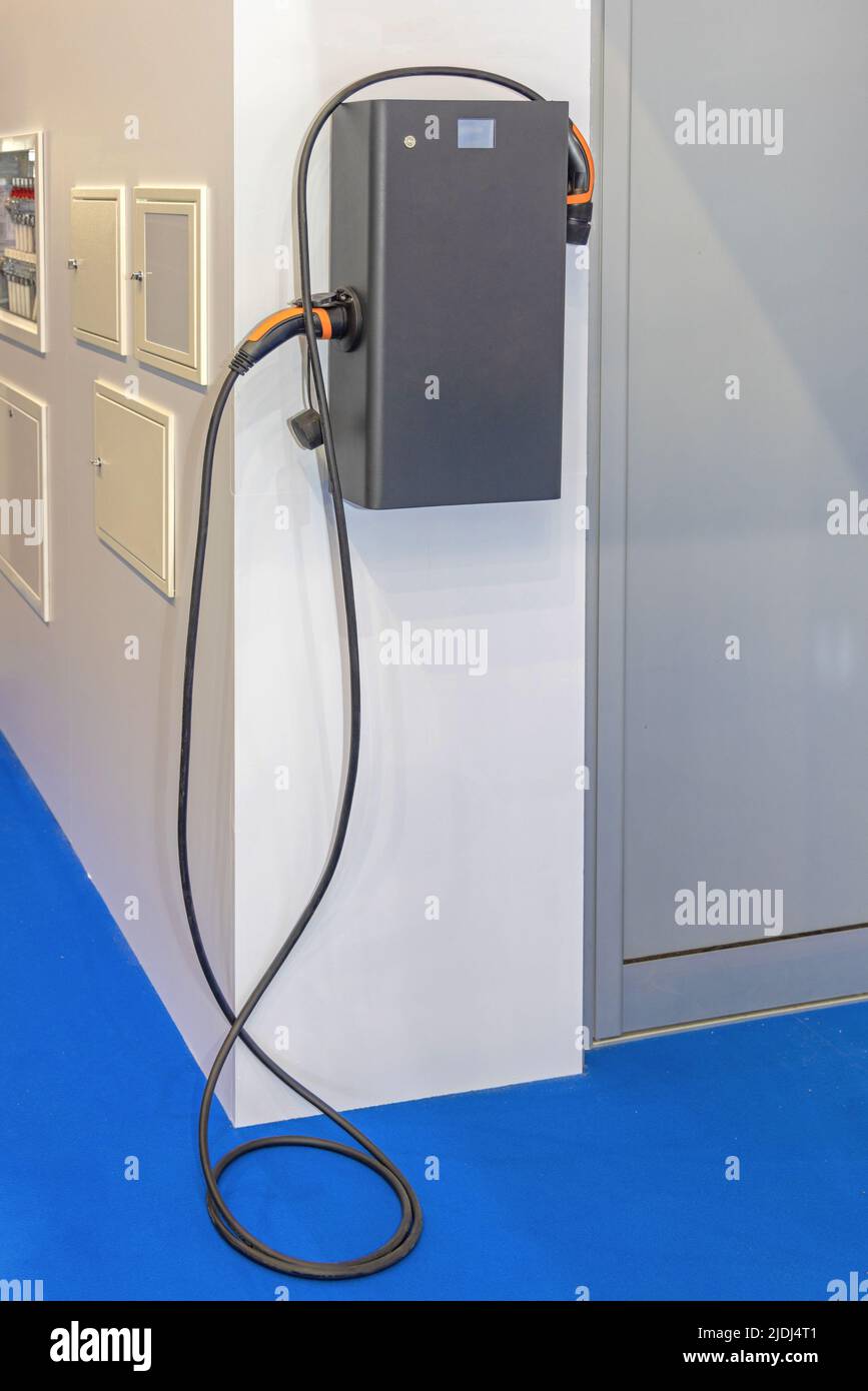Wall Mounted Electric Car Charger in House Garage Stock Photo Alamy