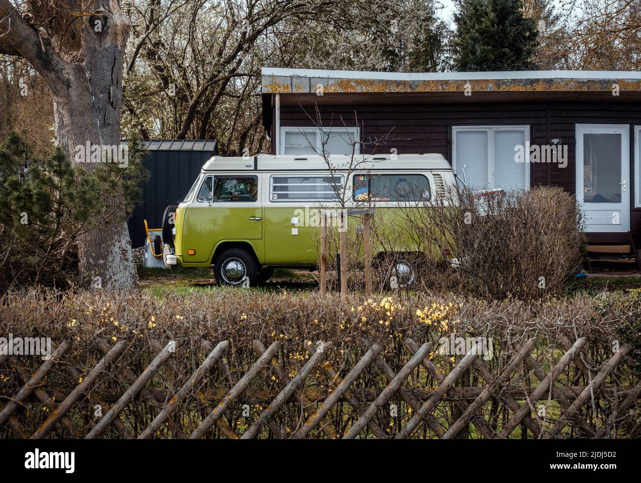 Sierksdorf, Germany - 03 31 2022: VW T2 camping bus in front of a wooden  house Stock Photo - Alamy