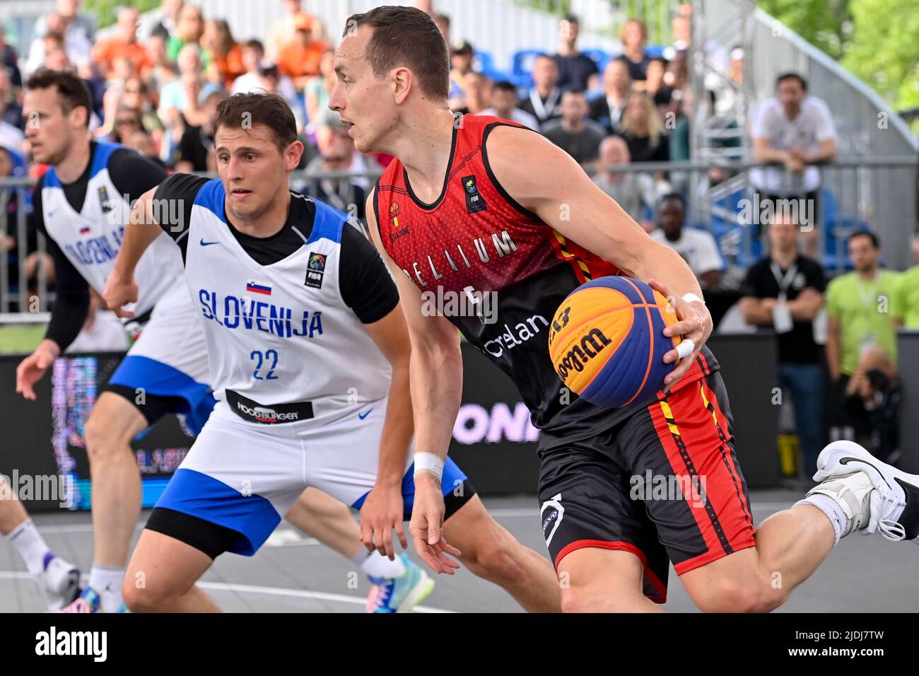 Antwerp. Belgium, 21 June 2022, Slovenia's Adrian Hirschmann and Belgium's Nick Celis pictured during a 3x3 basketball game between Belgium and Slovenia, in the first game (out of four) of the Men's Qualifier stage at the FIBA 2022 world cup, on Tuesday 21 June 2022, in Antwerp. The FIBA 3x3 Basket World Cup 2022 takes place from 21 to 26 June in Antwerp. BELGA PHOTO DIRK WAEM Stock Photo