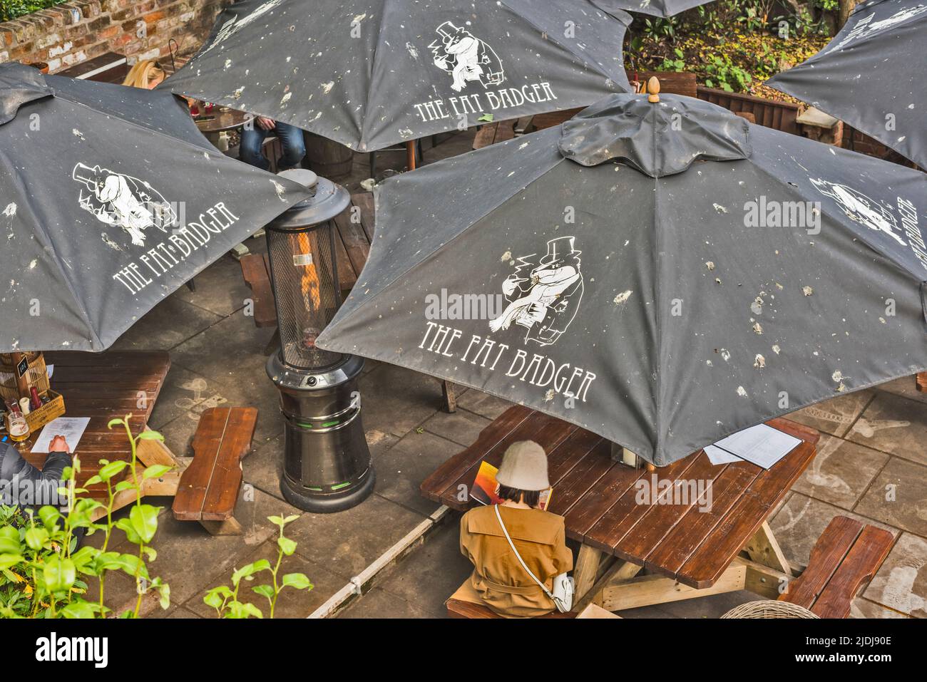Black Umbrellas of The Fat Badger Inn in York, England, UK, aerial view  Stock Photo - Alamy
