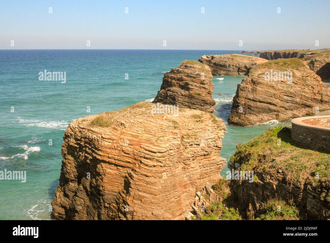 a day on the beach among the rocks and cold water Stock Photo - Alamy
