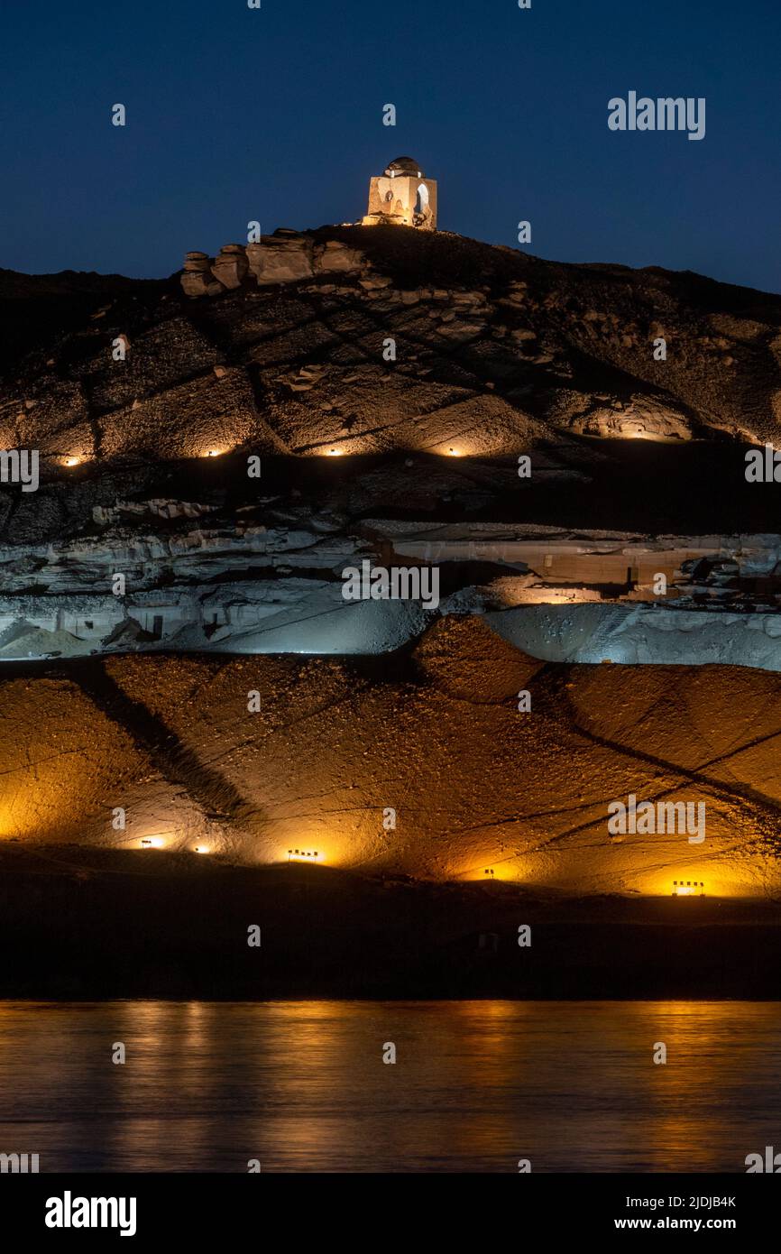 View of Tombs of The Nobles from the River Nile at Aswan, Upper Egypt Stock Photo