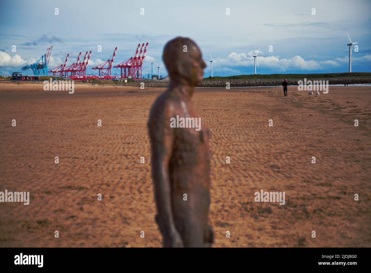 A cast from 'another place' by Antony Gormely at Crosby beach, Liverppol, UK Stock Photo