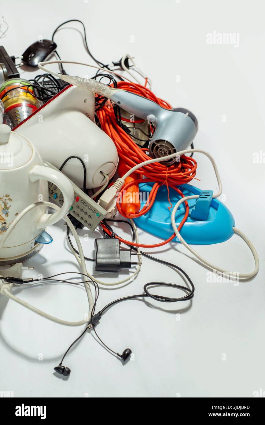 Lots of old electrical appliances for recycling ewaste. Sustainable living concept. Space for
