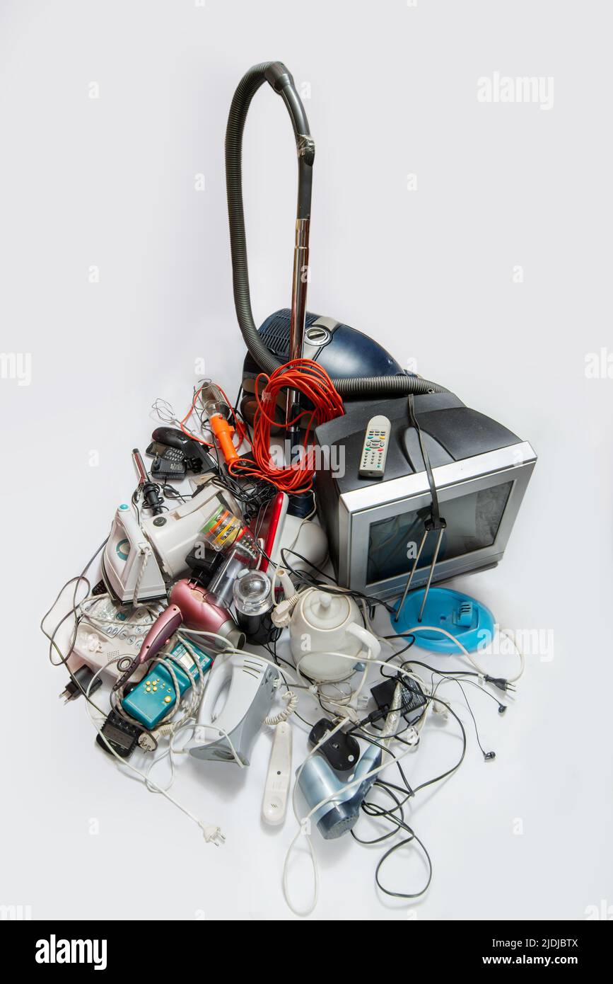 Heap  of electronic waste for recycling. Old household electrical appliances. Sustainable living concept Stock Photo
