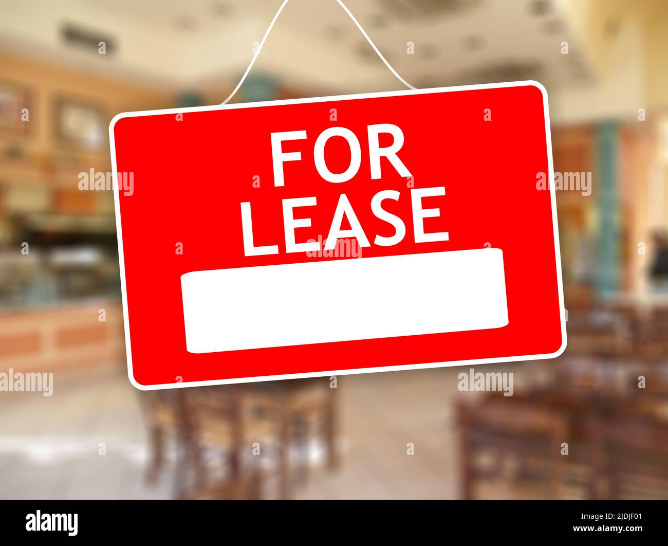 For Lease red sign with white word and empty space for text, promotion, advertising template. Hanged label out of store glass door, hire from agent. C Stock Photo