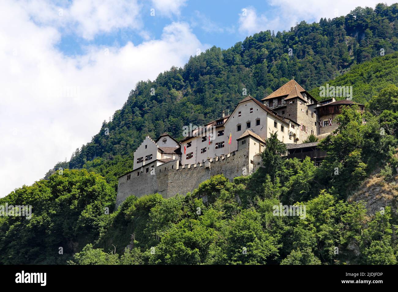 Medieval castle in Vaduz on the green hill, Liechtenstein Stock Photo
