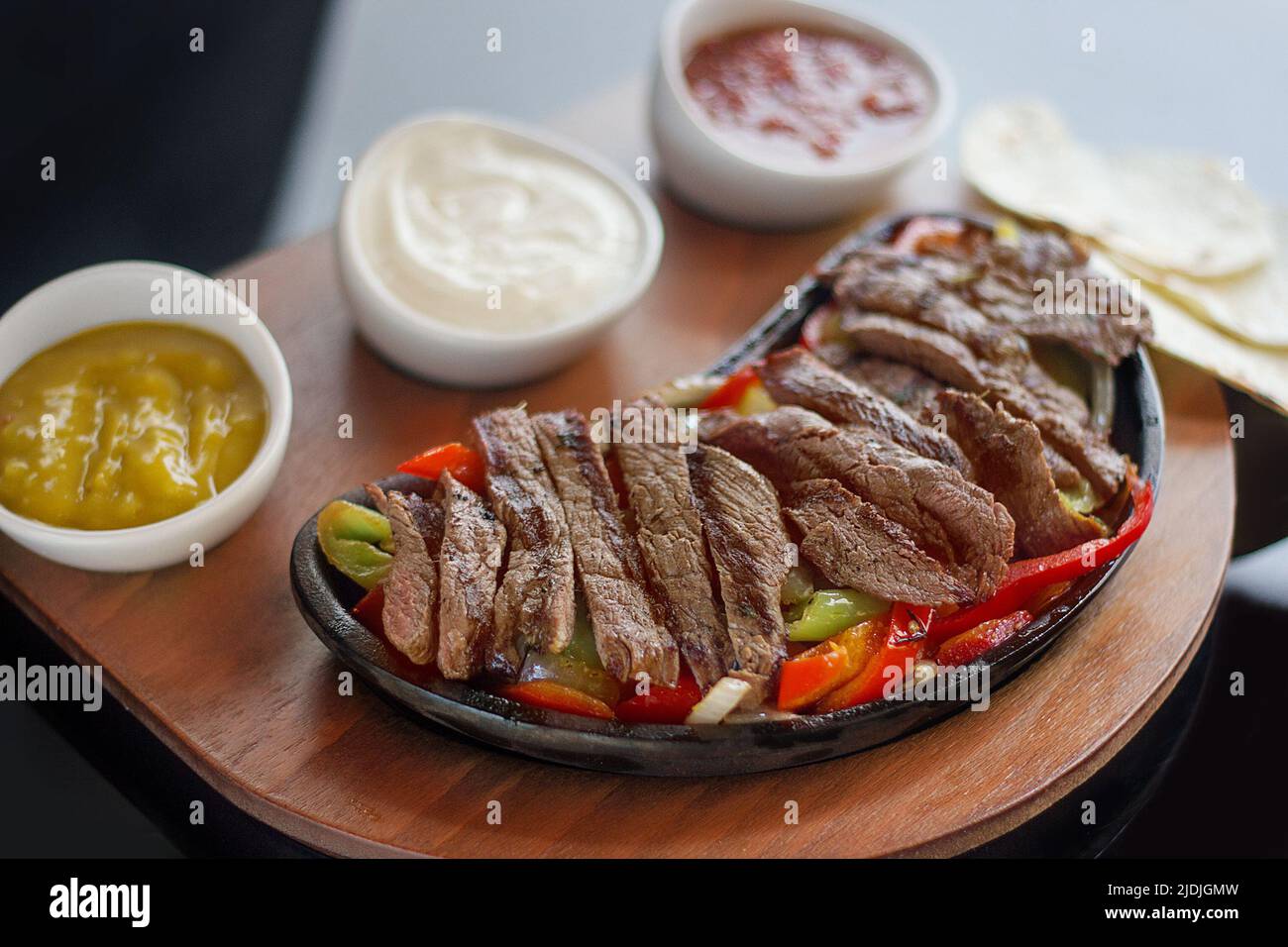 Beef Fajita With Sauces On Pan Stock Photo Alamy