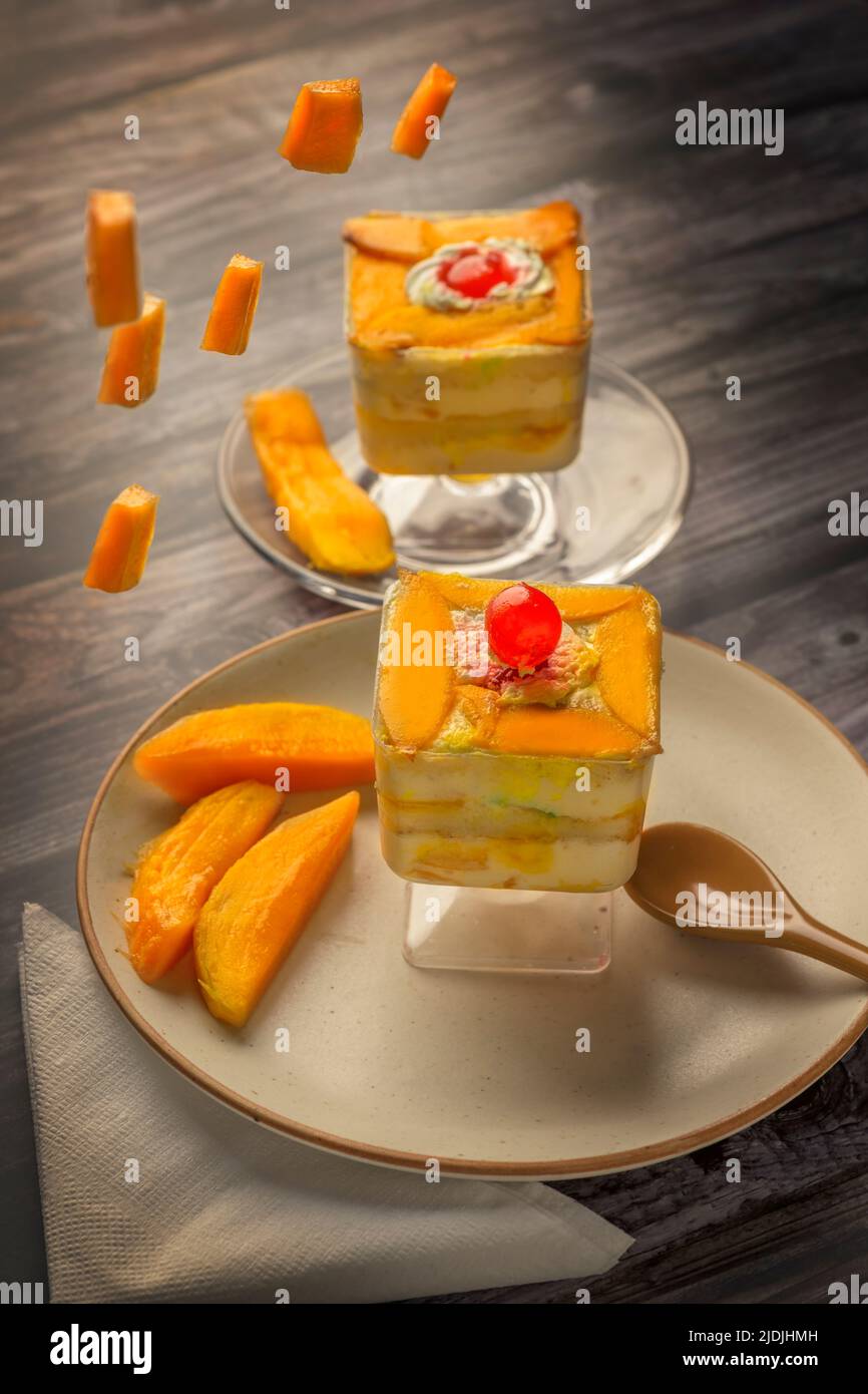 Mango mousse on a plate with copy space Stock Photo