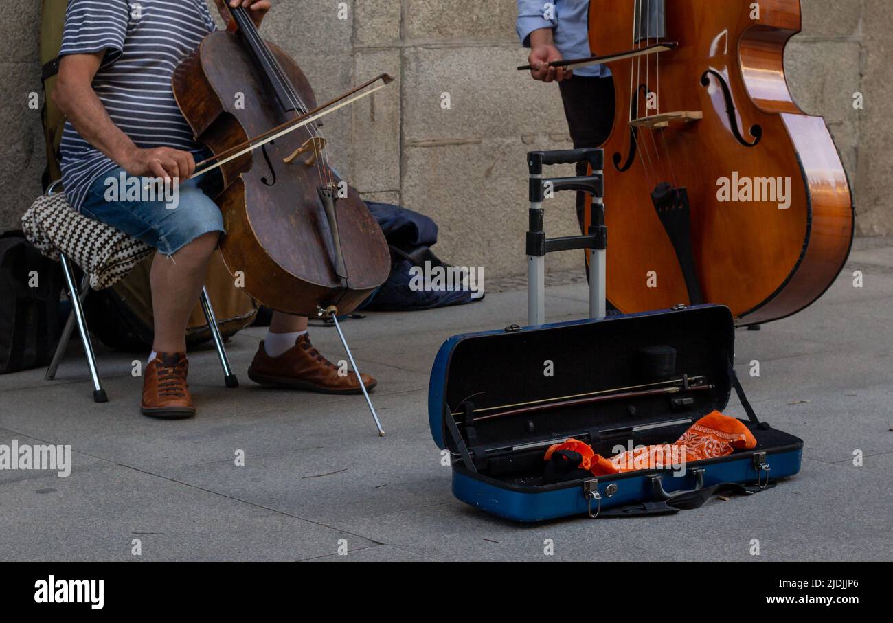 Street band playing stringed instruments Stock Photo Alamy
