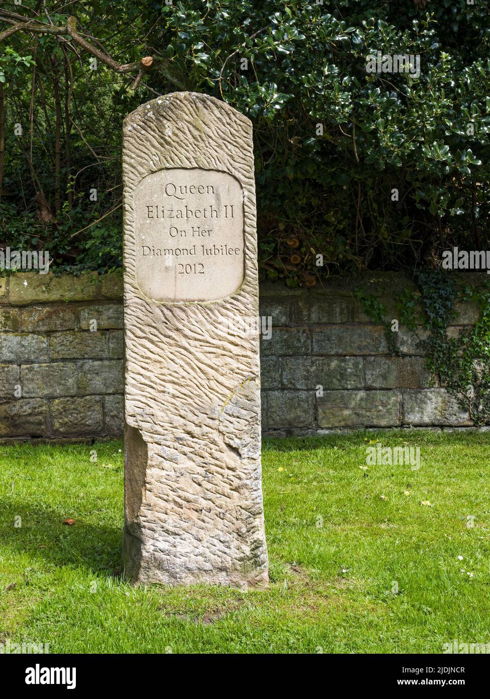 Bothal village in Northumberland, UK marks the diamond jubilee of queen Elizabeth the second with a memorial stone. Stock Photo