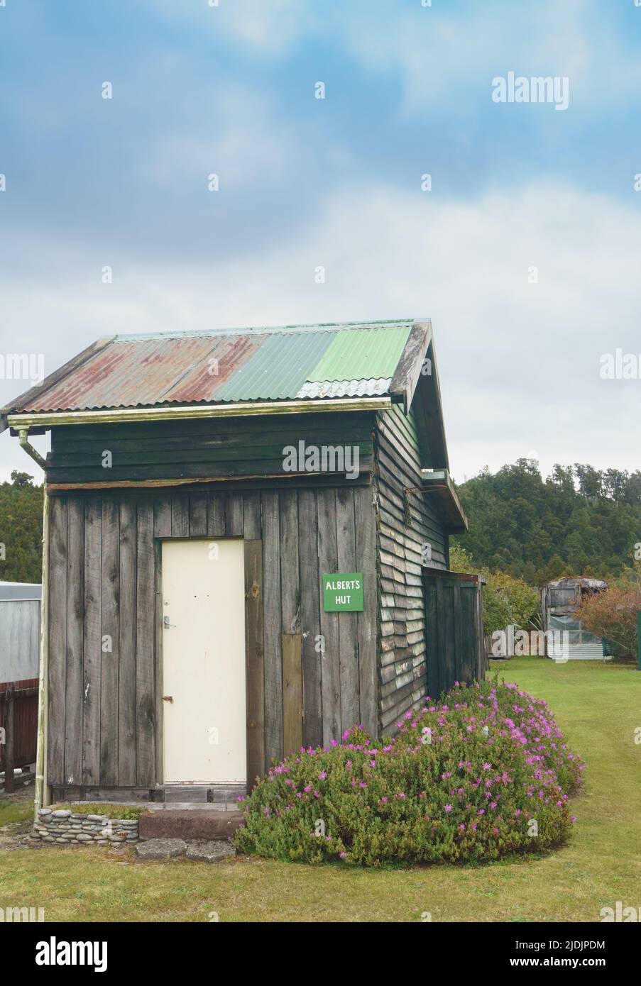 Okarito New Zealand - April 29 2022; Rustic tiny home or hut accommodation in remote small South Island coastal township Stock Photo