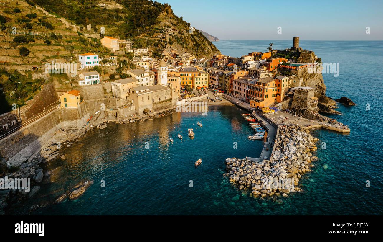 Aerial view of Vernazza and coastline of Cinque Terre,Italy.UNESCO Heritage Site.Picturesque colorful village on rock above sea.Summer holiday,travel Stock Photo