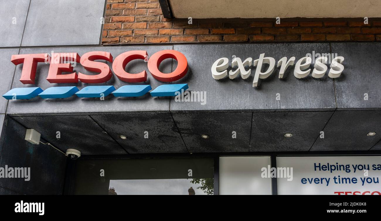 Tesco express sign over their store in Inchicore, Dublin, Ireland. Stock Photo