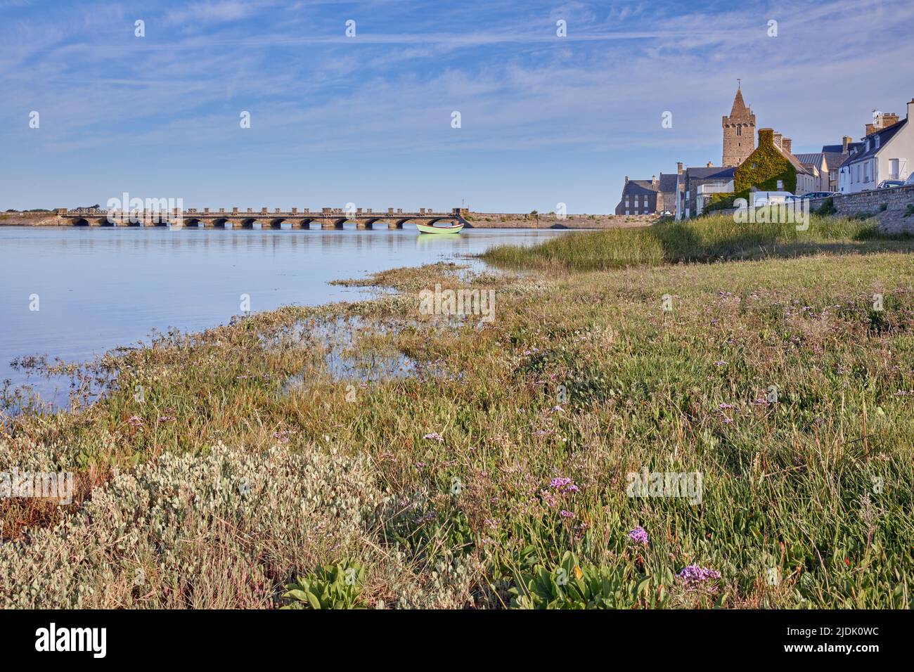 Image of Port Bail, Normandy, France with church and bridge at high tide early morning. Stock Photo