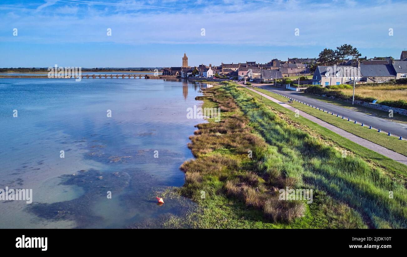 Image of Port Bail, Normandy, France with bridge and church at high tide early morning. Stock Photo