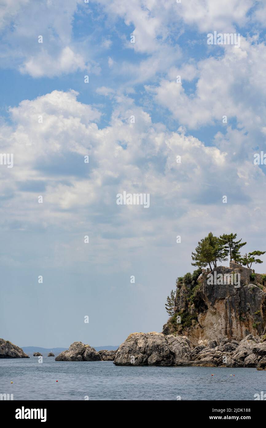 Beautiful summer Mediterranean coast with large sea stones Stock Photo
