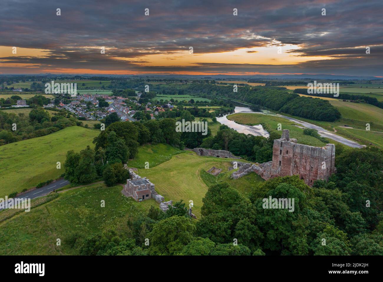 Norham Castle high above the River Tweed, built by the Bishops of Durham one of the most important places on the Anglo Scottish Border Stock Photo