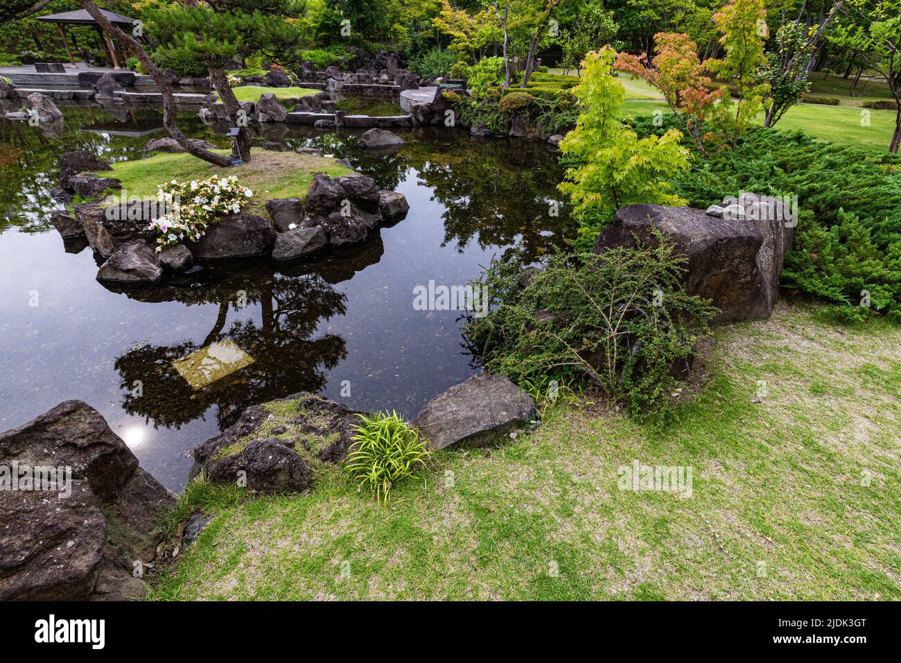 21st Century Memorial Park Hayama no Mori is adjacent to Hayama Park selected as one of the 100 Best Historical Parks in Japan.  There is a Japanese g Stock Photo