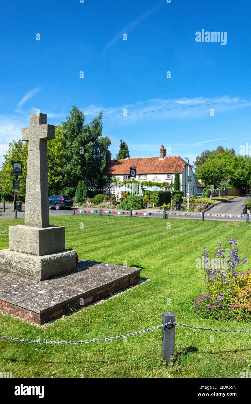 War Memorial and The Red Lion Pub on the Green, High Street, Chalgrove