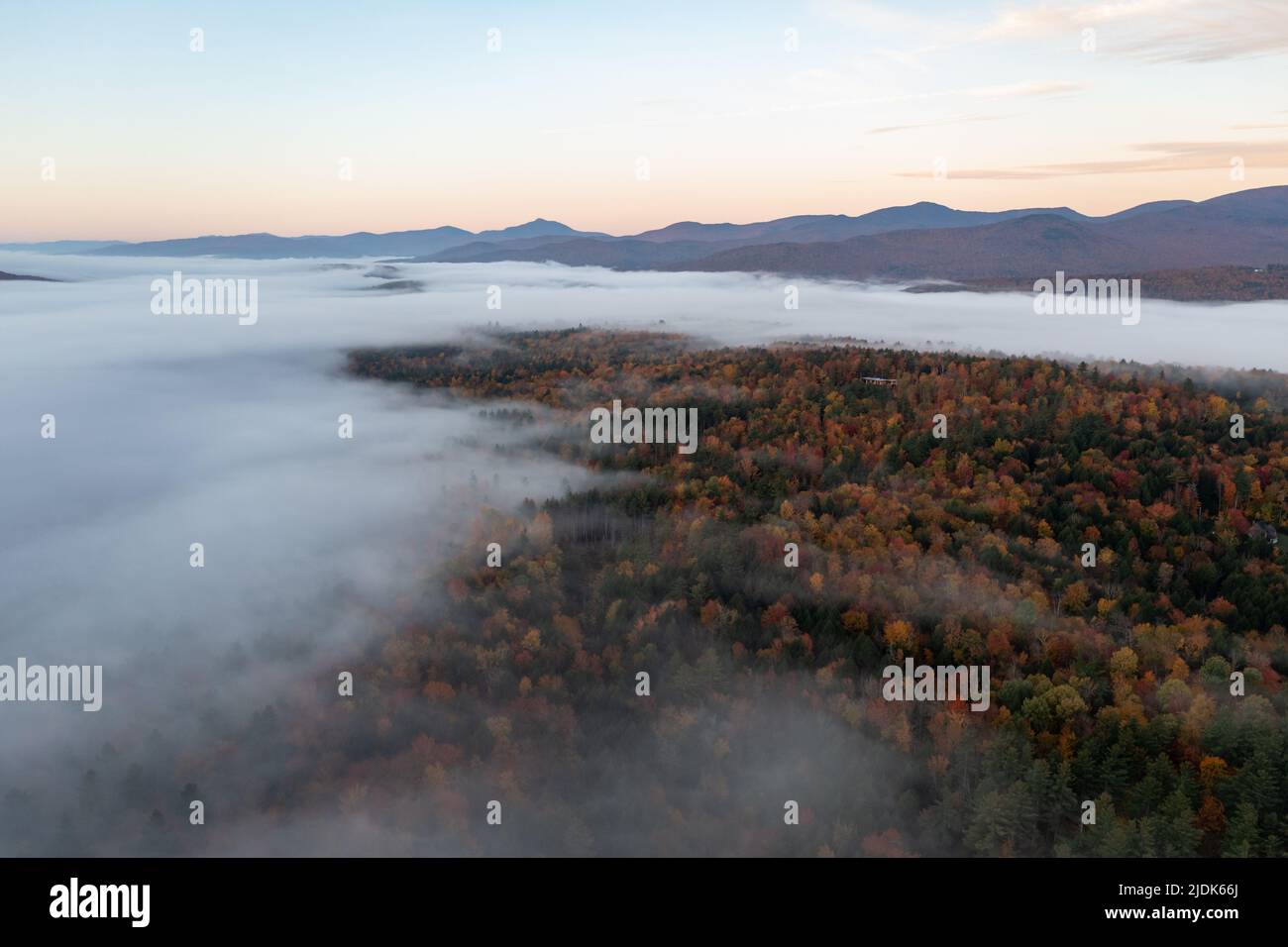 Panoramic view of peak fall foliage in Stowe, Vermont. Stock Photo