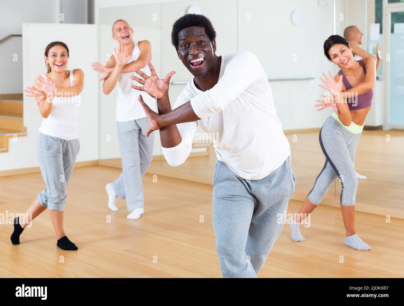 Group of multinational people practicing dance techniques Stock Photo